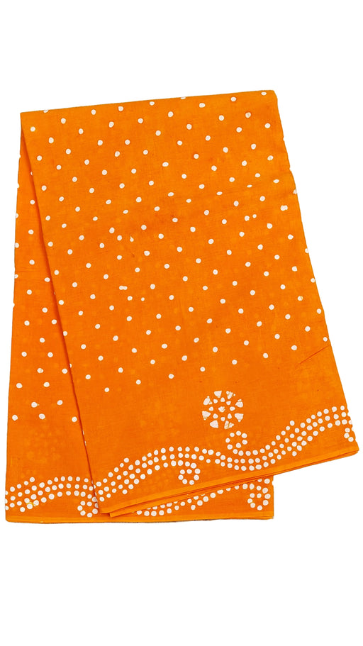 Orange fabric with white polka dots and border 